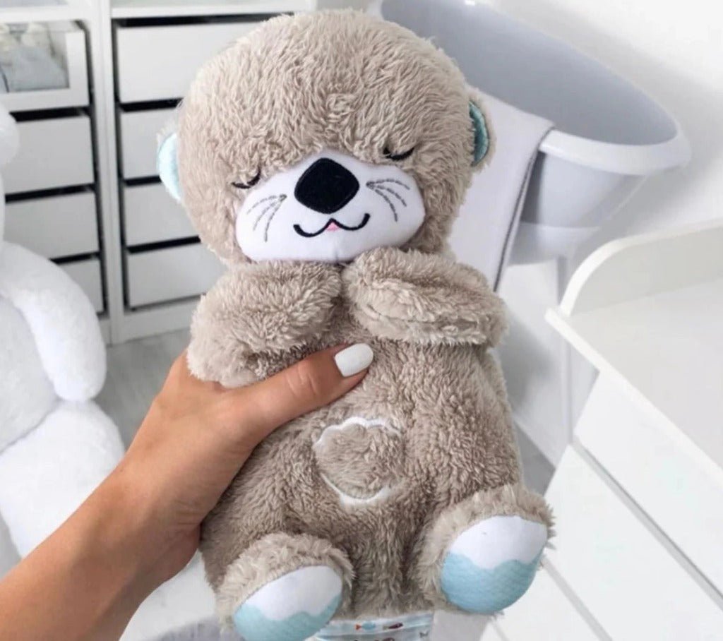 Lontrinha de Pelúcia que Respira e Toca Música - Auxiliar de Sono e Ruído Branco